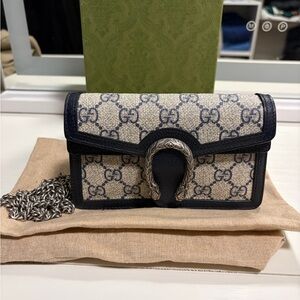 Gucci Black and Tan Leather Detail